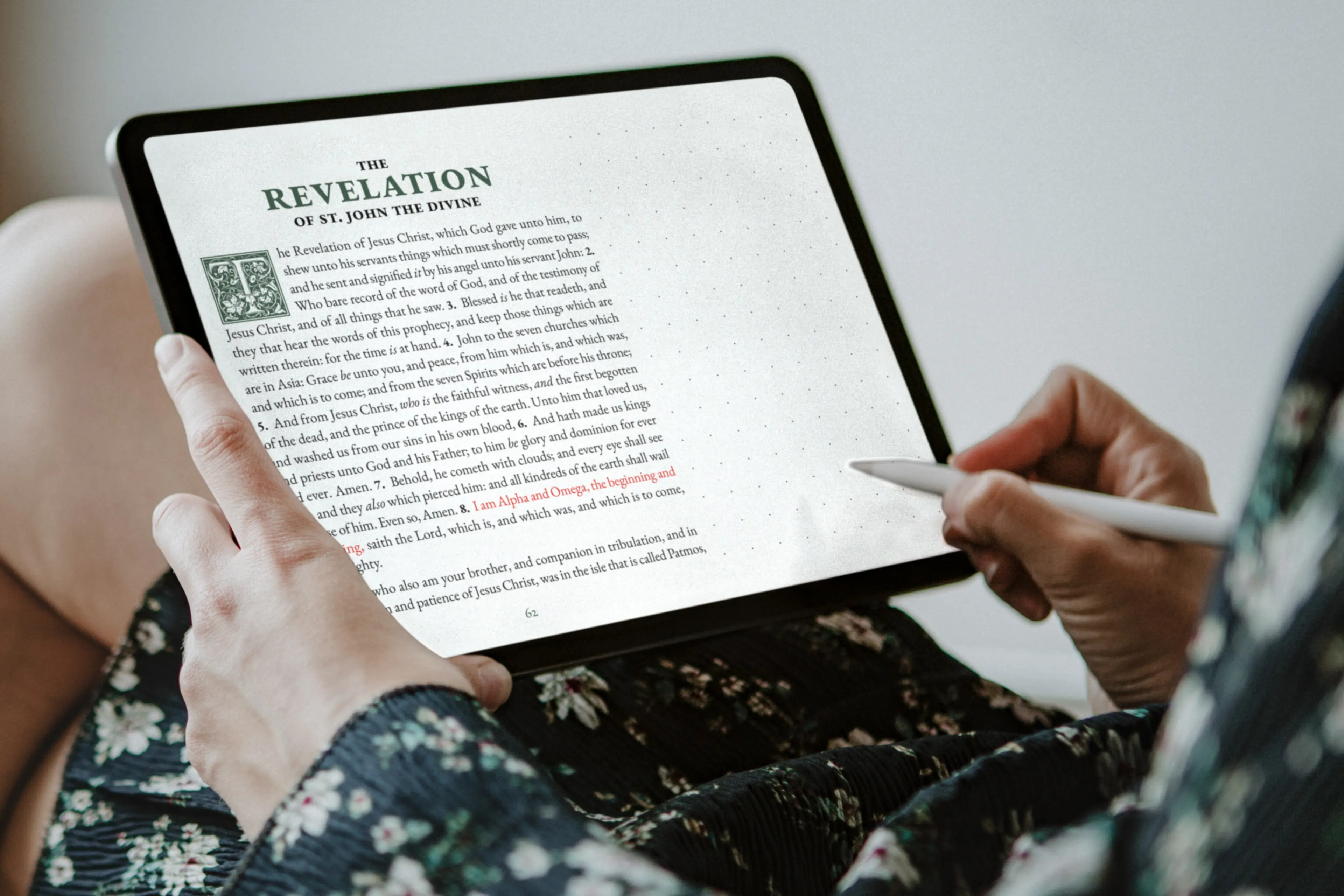 Person reading KJV Digital Notetaking Bible on tablet with stylus, over-the-shoulder view